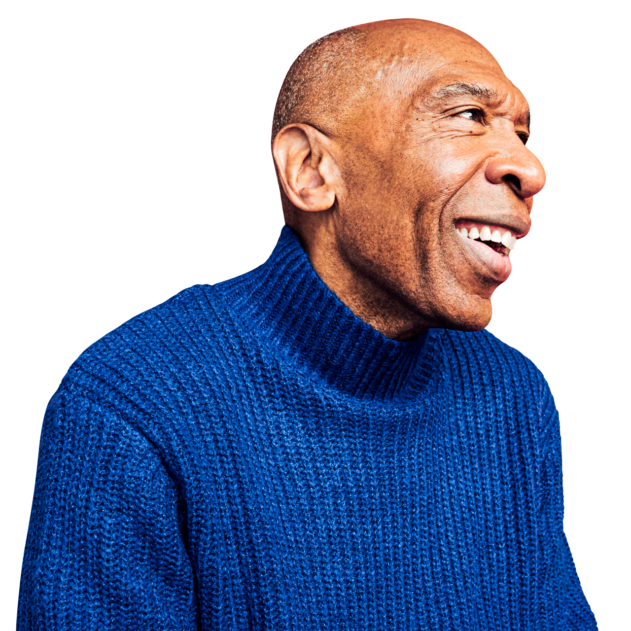 Bald man wearing blue sweater smiling