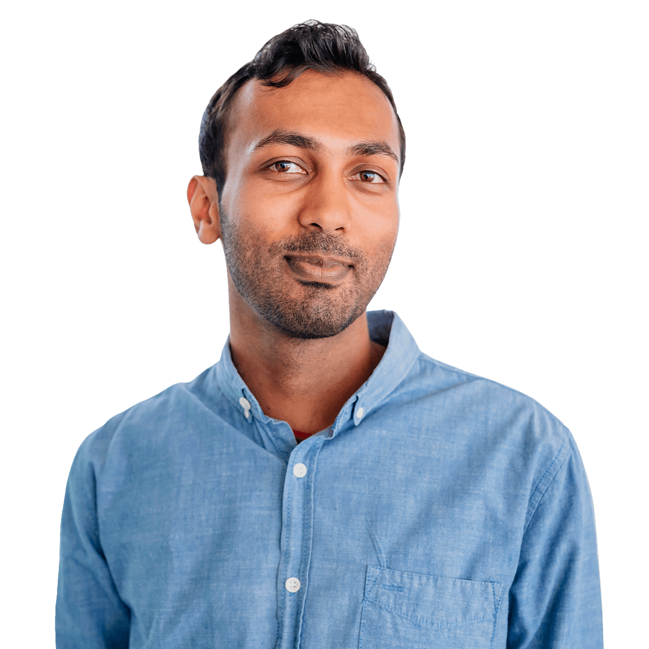 Man wearing blue shirt looking at the camera